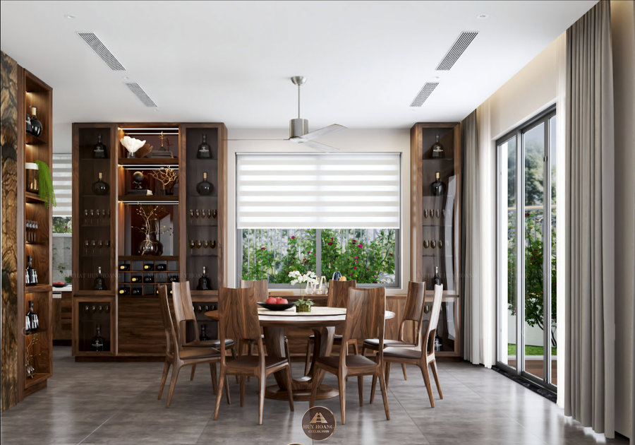 Thiết kế ph&ograve;ng ăn biệt thự với bộ b&agrave;n tr&ograve;n gỗ &oacute;c ch&oacute; 8 ghế
