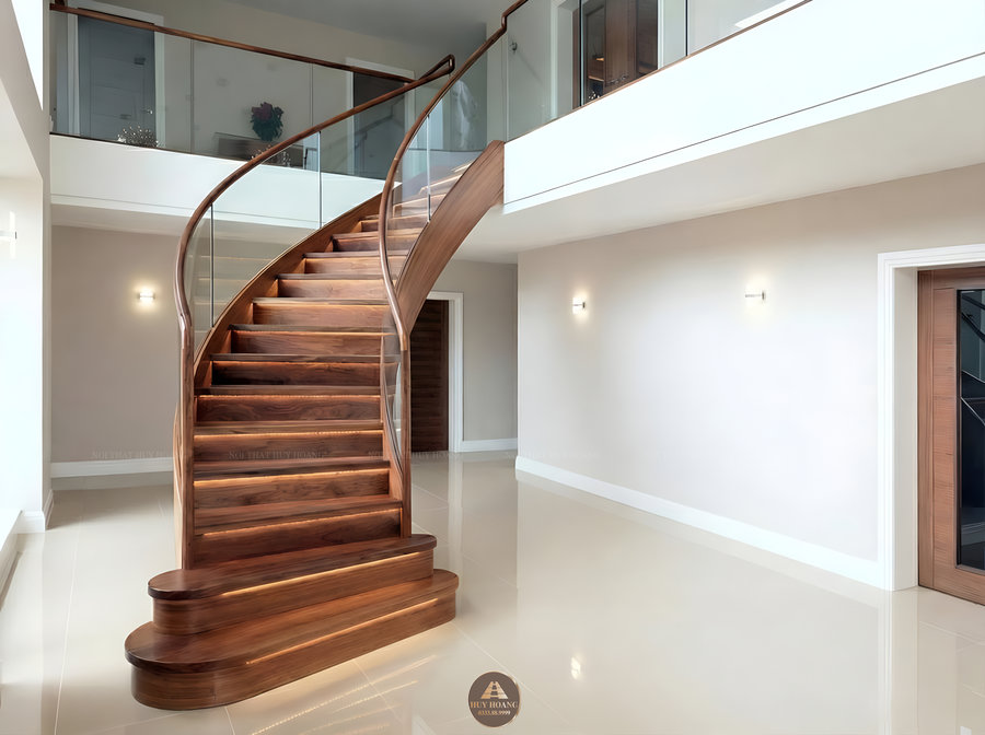 Cầu thang gỗ &oacute;c ch&oacute; uốn cong kết hợp đ&egrave;n LED hiện đại